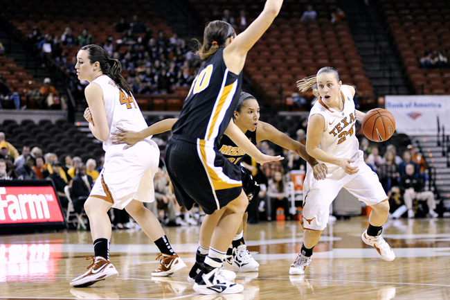 <p>Chassidy Fussell (24) looks to drive past an outstretched Tiger defender. Fussell notched 22 points to lead all scorers in this contest. </p>
