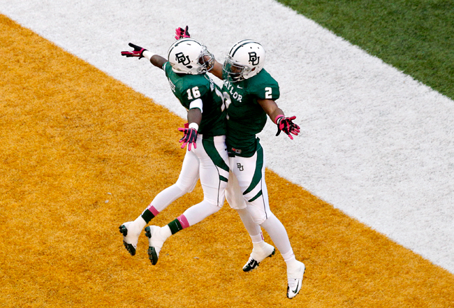 <p>Baylor wide receivers Tevin Reese (16) and Terrance Williams (2) celebrate in the end zone following Williams' touchdown reception in the first half of the game against TCU Saturday, Oct. 13 in Waco, Texas.</p>
