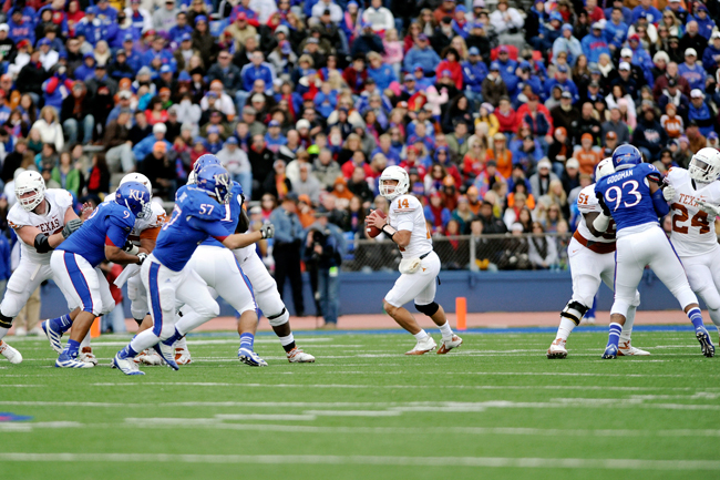 <p>Quarterback David Ash looks to throw against Kansas last weekend, Oct. 27. Thanks to difficulty first against Oklahoma and then against Kansas, Ash must have a solid game to stay ahead of Case McCoy on the depth chart.</p>
