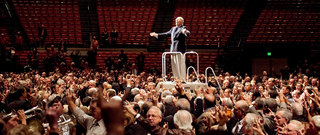 <p>Former band director Vincent R. Dinino leads the Longhorn band in “The Eyes of Texas” and concludes the memorial service for Darrell K Royal at The Frank Erwin Center Tuesday afternoon. Song performances and speeches by friends of Royal such as current football head coach Mack Brown, Willie Nelson and President Bill Powers celebrated the former coach’s life and influence.</p>
