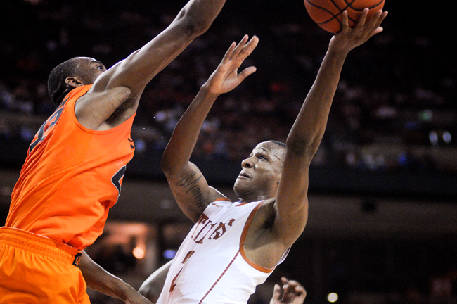 <p>Damarcus Holland attempts a basket during the Longhorns’s 72-59 loss against Oklahoma State on Feb. 9.  Myck Kabongo and Jonathan Holmes will both return to the court as Texas faces Iowa State Wednesday.  </p>
