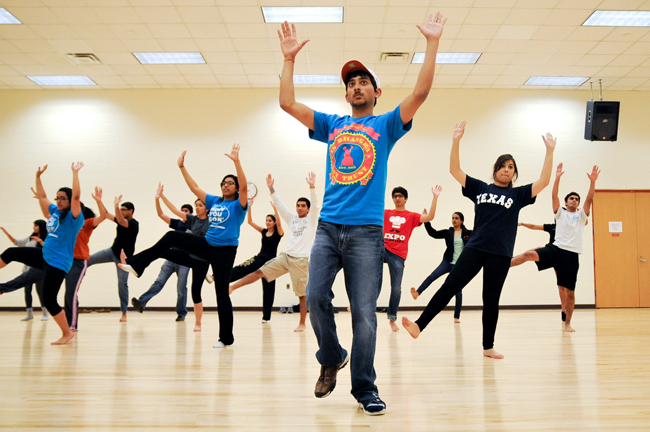 <p>Junior Anish Nagar demonstrates how to dance a traditional Indian Jhoom at the Recreational Sports Center Wednesday evening. The dance clinic was hosted by the Indian Culutral Association.</p>
