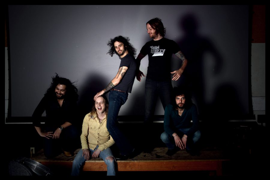<p>Musicians (left to right) Shawn Paul Alvear (percussion), Christopher Jay Cowart (lead guitar), Aryn Jonathan Black (vocals), Shaun Diettrick Avants (bass), and David Finner (rhythm guitar) are the members of local Austin rock band, “Scorpion Child”. Their shows are characterized by their consistently high-energy performances. </p>
