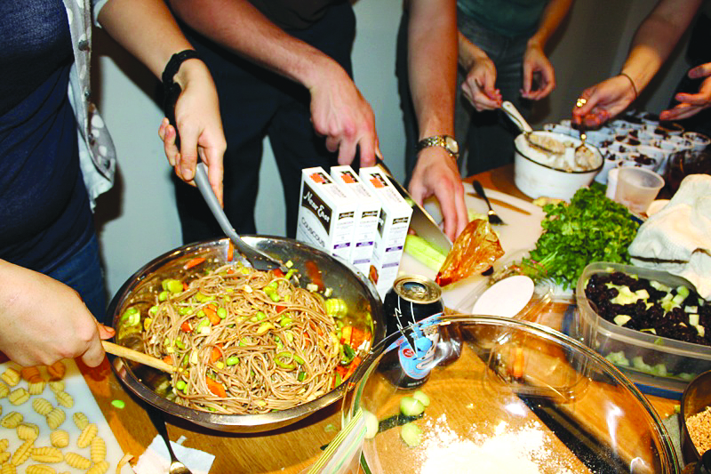 <p>Chaos Cooking involves over more than strangers cooking together in one home and enjoying the results. Events like these are increasing in popularity at SXSW (Photo courtesy of Chaos Cooking).</p>
