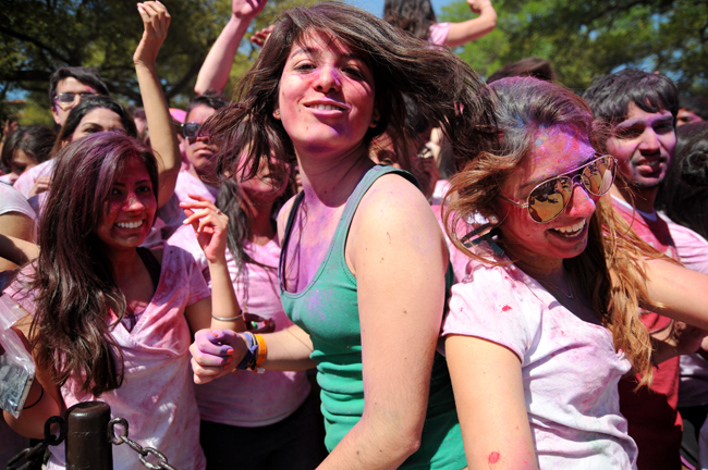 <p>People enjoy the festival of colors “Holi” at South Mall on a Sunday afternoon. The event involved around 6000 students and was organized by the the Hindu Students Association to celebrate the Indian holiday. </p>
