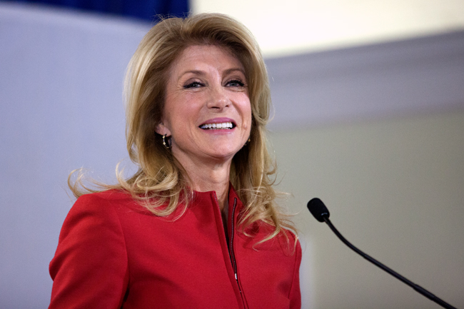 <p>State Sen. Wendy Davis, D-Fort Worth, gives a speech at her victory party in Fort Worth after officially nabbing the Democratic nomination for governor Tuesday. Davis touted education and women's rights in her speech and will face Attorney General Greg Abbott in the general election.</p>

