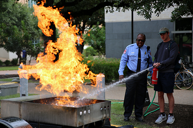 2015-10-06_safety_week_kickoff_firefighters_extinguisher_Qiling