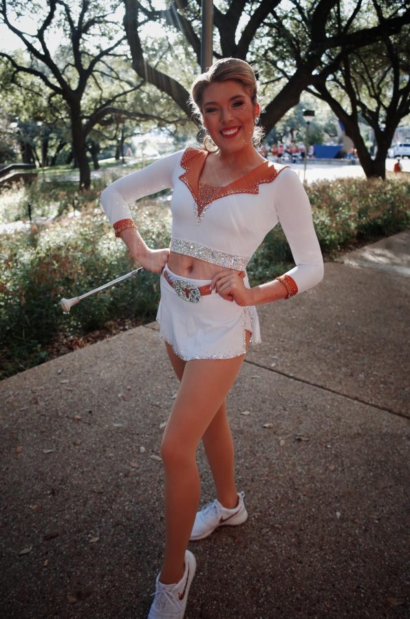 Longhorn Feature Twirler Aidyn Mentry bakes for a cause