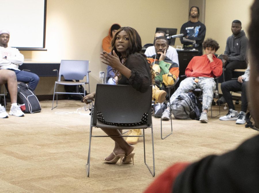 UT student body president Kiara Kabbara discusses the benefits of joining the government with a group of students. Every Monday from 5-6 p.m., Power Hour events take place in the Sweatt Center to promote academic excellence among African American males.