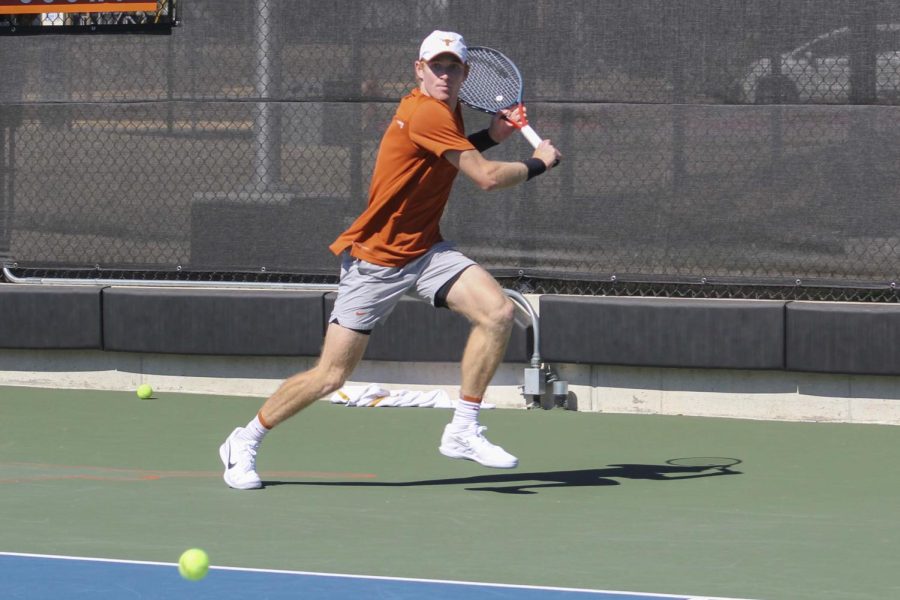 On Sunday, February 13th Micah Braswell makes a run for the ball at the UCF vs UT men’s tennis match.