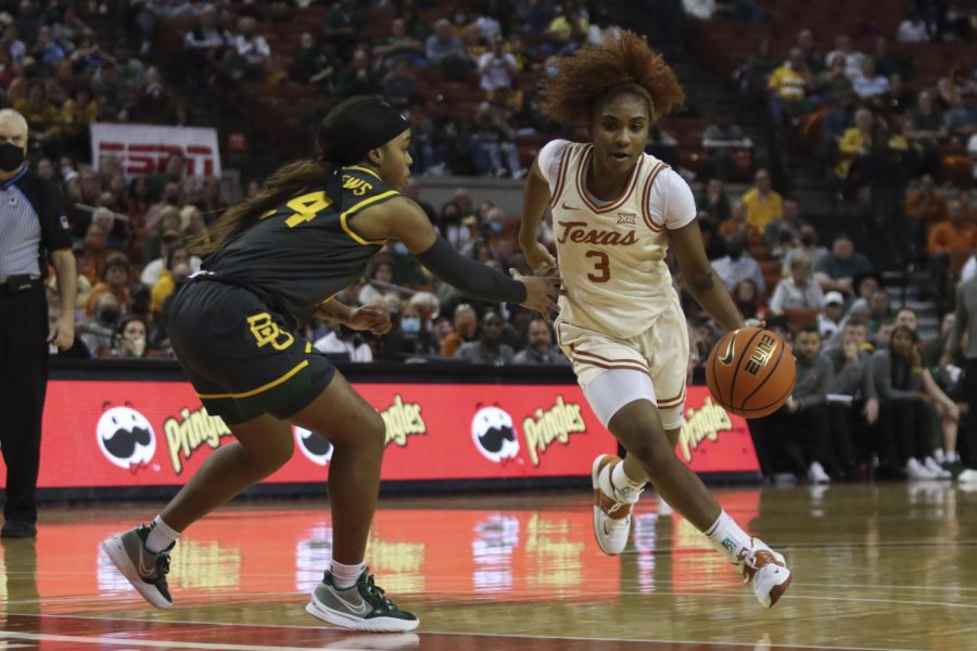 Texas guard Rori Harmon dribbles past guard Sarah Andrews. Texas Women’s Basketball played Baylor at the Frank Erwin Center on Feb. 6.