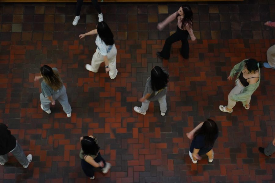 A group of UT students practice dance routines after-hours in the Jester West dormitory on Feb. 1, 2022. At night when the dining halls close, the lobbies of Jester West become the stomping grounds for dancers looking to perfect their techniques with their group.