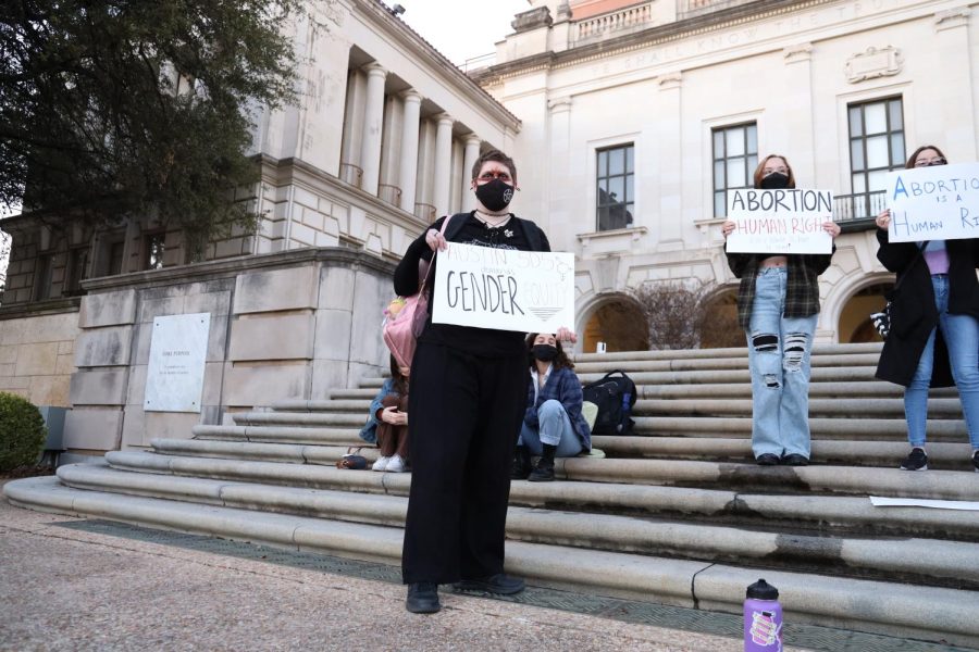 Students rally outside the Tower in support of abortion rights on Feb. 1, 2022. Members of Austin Students for a Democratic Society, read speeches, chanted and held signs for the national SDS day of action.