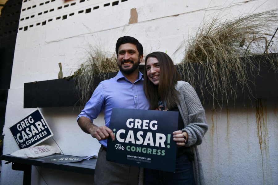 Greg Casar with a supporter at his campaign rally in Downtown Austin on Feb. 13, 2022. Casar held a rally to gain support and kick off early voting starting on Feb. 14.