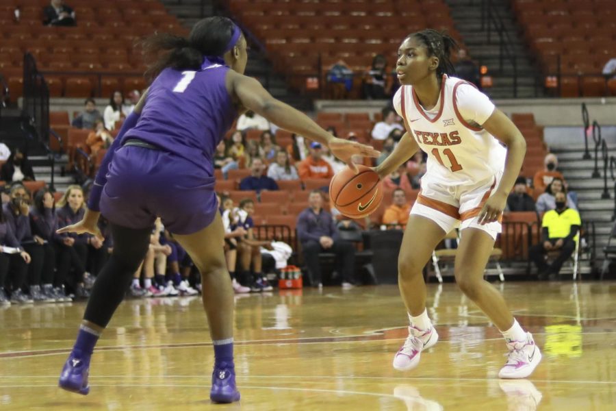 Guard Joanne Allen-Taylor looks for a teammate to pass the ball to. Texas beat TCU at the Frank Erwin Center on February 26, 2022.