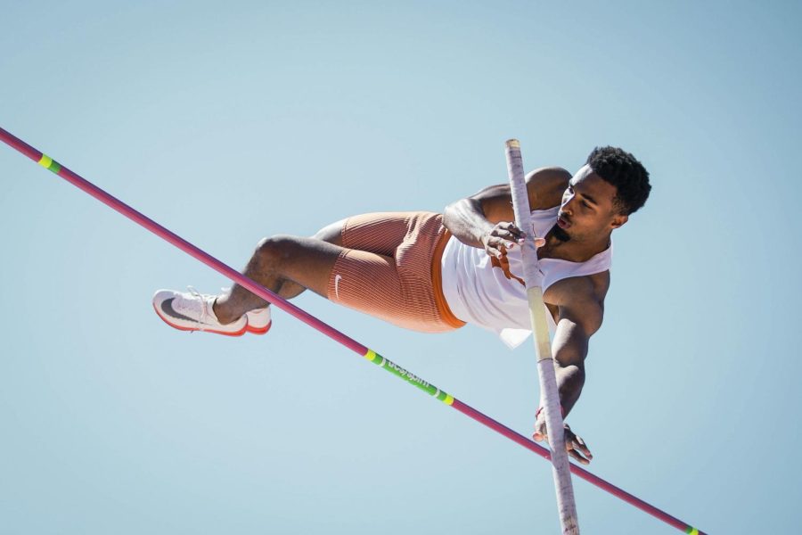 Junior Leo Neugebauer propels himself above a pole vault lath during the  94th Clyde Littlefield Texas Relays Thursday, March 24, 2022, at Mike A. Myers Track and Soccer Stadium. Neugebauer, a native of Leinfelden-Echterdingen, Germany, holds the title of being a three-time All-American.