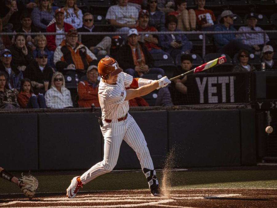 Texas batter Ivan Melendez hits a ground ball against Rice at UT's UFCU Disch-Falk Field on Feb. 26, 2022. Melendez was named 2021 First-Team All Big 12 Designated Hitter and All College World Series honors during his first season as a Longhorn redshirt sophomore.