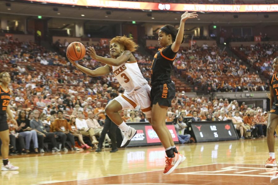 Rori Harmon goes up for a shot on March 5, 2022. Playing their final game at the Frank Erwin Center, Texas beat OSU 50-65.