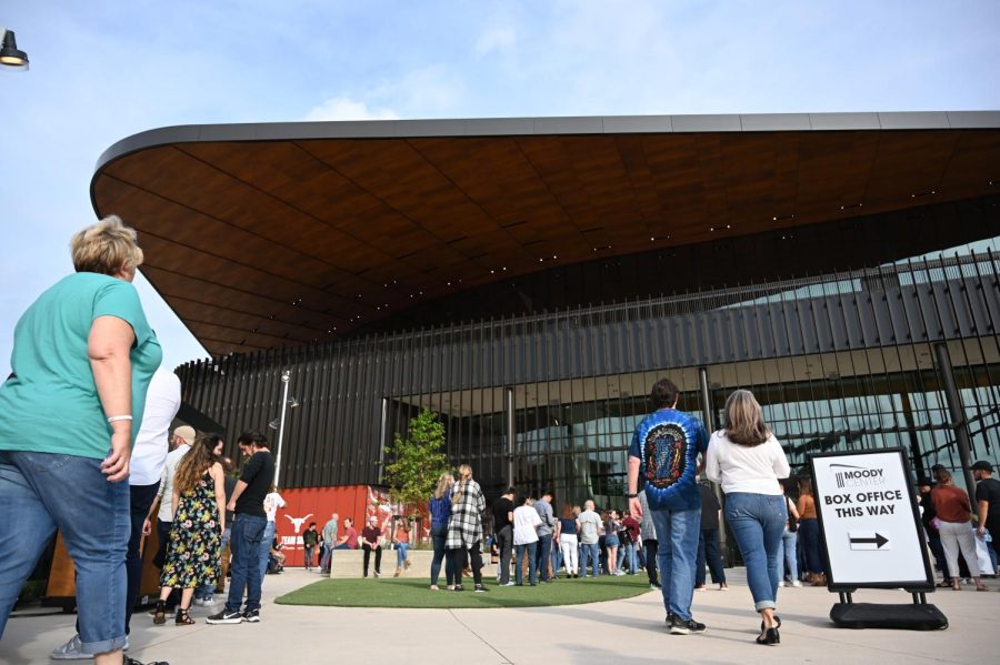 Fans wait for the Moody Center doors to open on the Dell Technologies Plaza on Apr. 20, 2022. The venue featured a performance from Grammy award winner John Mayer and artist YEBBA in its first public concert.
