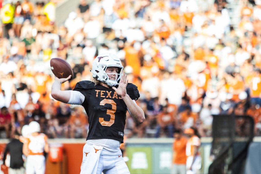 Redshirt freshman quarterback, Quinn Ewers, attempts a pass during the Orange and White spring football game on April 23, 2022. The game showcased the talents of Ewers and sophomore quarterback Hudson Card as they competed for the starting position this fall.