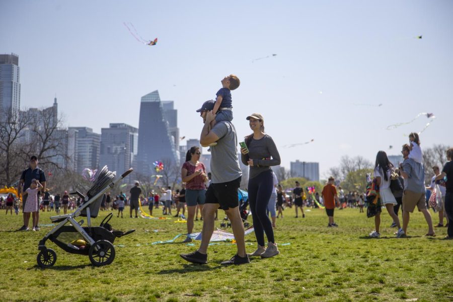 A toddler looks up at the sky as kites fly overhead at Zilker Park. Zilkers Kite Festival was a popular attraction for individuals and families.