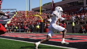 No. 22 Longhorns upset by Texas Tech in OT to open conference play