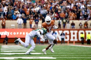 No. 24 Texas keeps Big 12 championship hopes alive with resilient win against Baylor