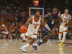Sophomore Tyrese Hunter advances down the court while dribbling during a game against UT El Paso on Nov. 07, 2022. The Longhorns won 72-57.
