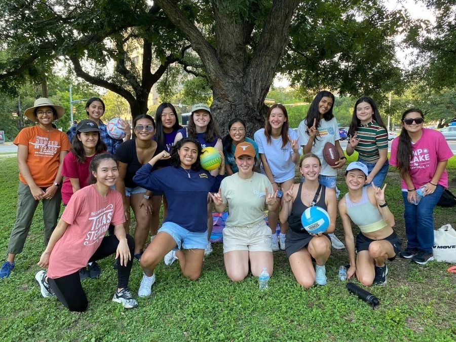 The Society of Women Engineers pose for a team photo after a game of soccer.