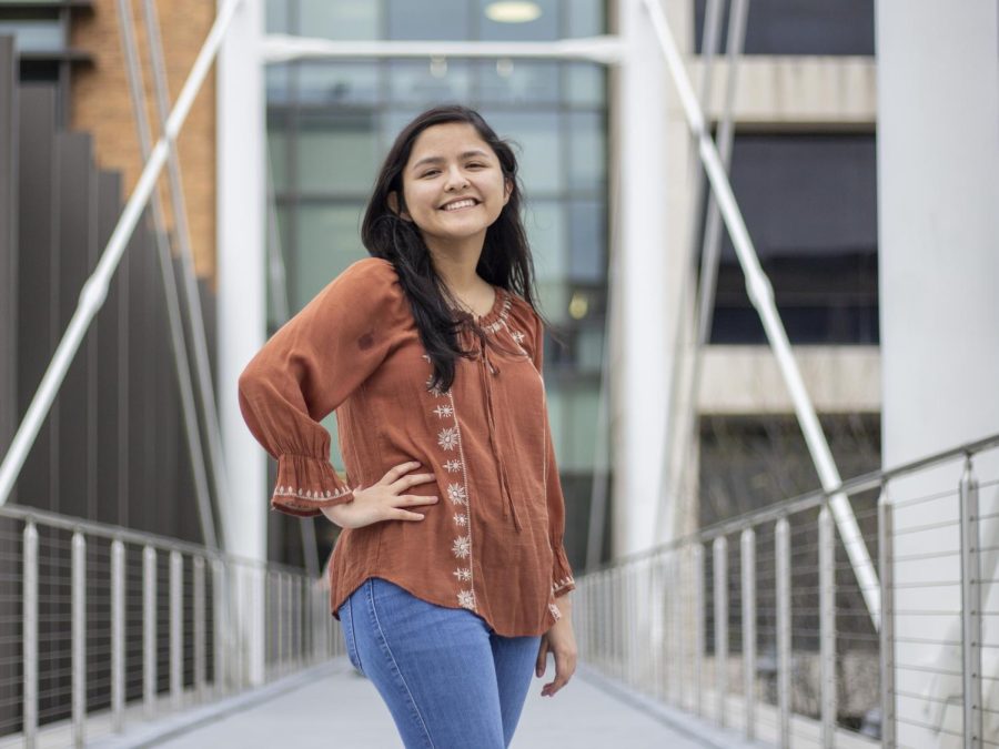 Lucero Ponce poses for a portrait on the Moody Pedestrian Bridge. Ponce is running unopposed to be the Texans next Editor-in-Chief.