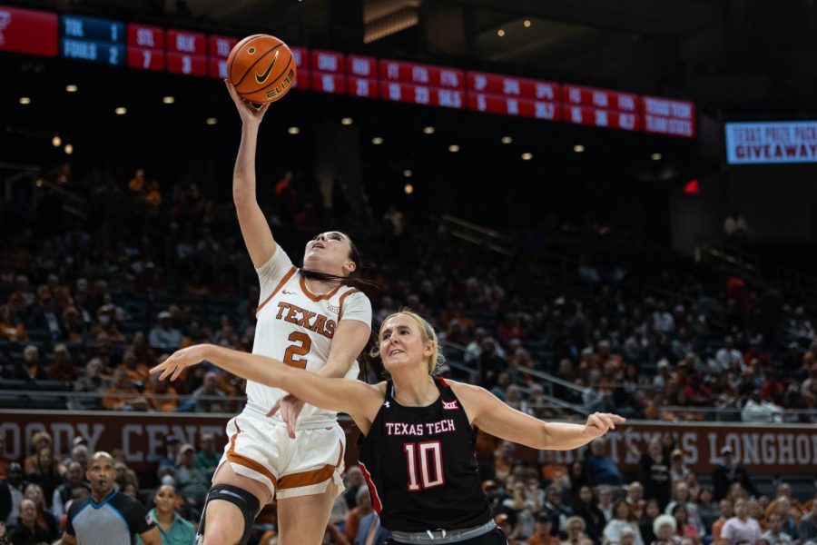 Texas+guard+Shaylee+Gonzales+attempts+a+layup+against+Texas+Tech+at+the+Moody+Center+on+Feb.+8%2C+2022.+Texas+defeated+Texas+Tech+80-71.