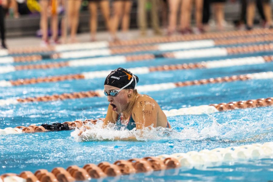 Swimmers compete in the Big 12 Swimming and Diving Championship at the Lee and Joe Jamail Texas Swimming Center on Feb. 25, 2022. The University of Texas was named Big 12 Champions for men's and women's events. 