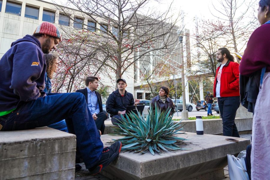 Members of Underpaid at UT discuss their organization's agenda on Feb. 17, 2023. 