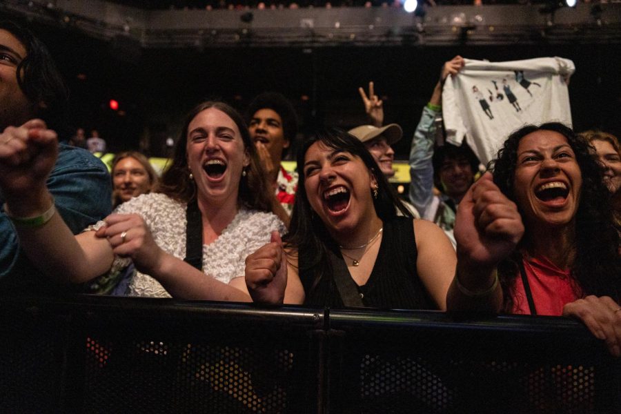 Fans shout and dance while Japanese pop-punk band Otoboke Beaver performs onstage at the ACL Live Moody Theater on March 16, 2023.