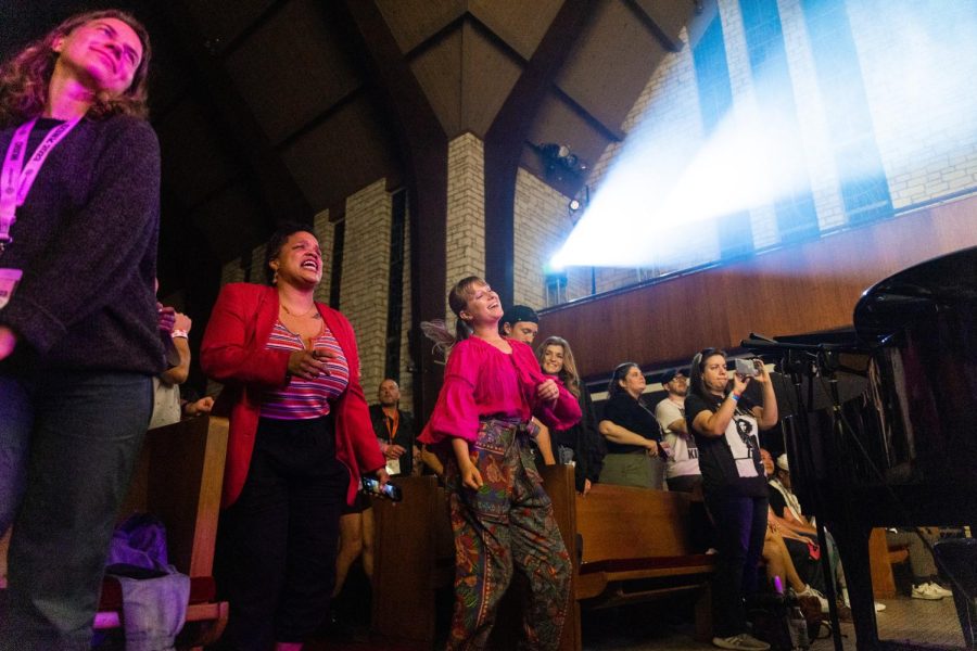 Concertgoers dance and sing aloud as Sir Woman performs at Central Presbyterian Church on March 16, 2023.