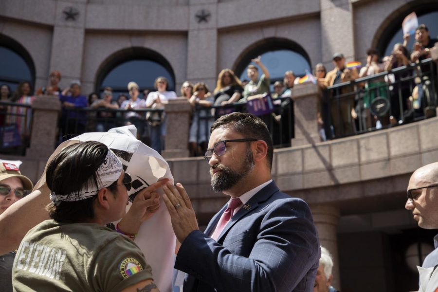 A counter-protester confronts the crowd at a rally at the Texas state capitol on March 27, 2023. The rally was held in protest of House Bill 1869 and Senate Bill 14. 