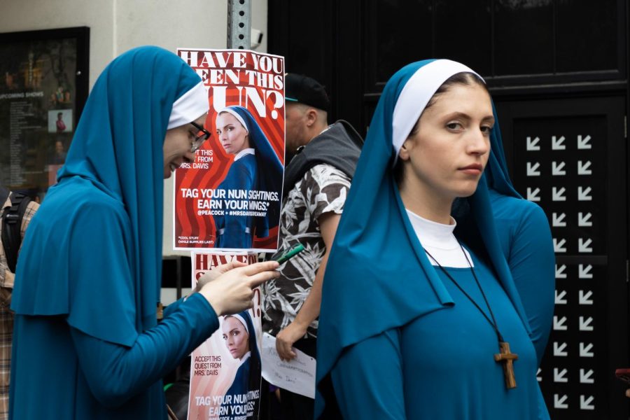 A woman dressed as a nun stands outside the Stateside theater on March 14, 2023. Ahead of the premiere of their new show "Mrs. Davis," Peacock organized a group of women to walk around SXSW dressed as nuns.