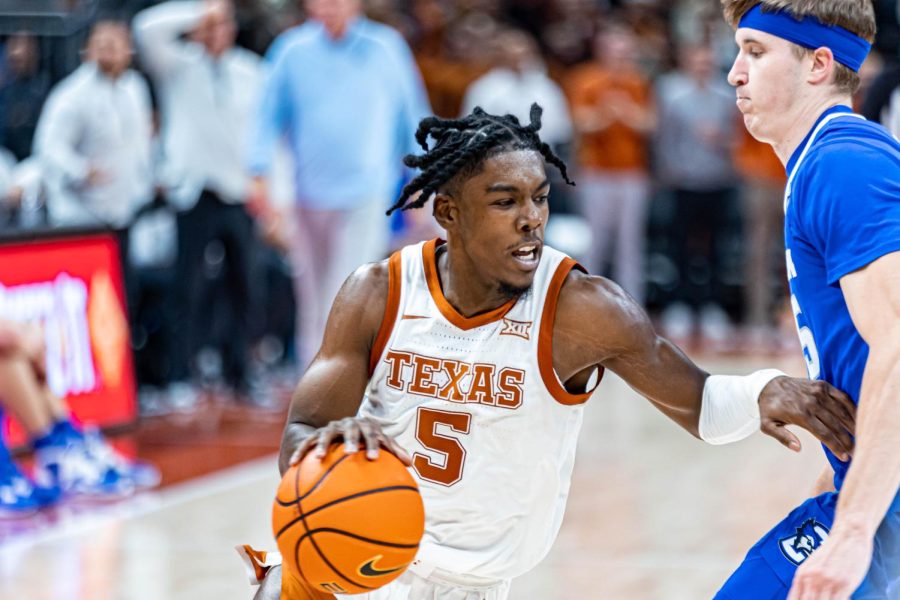 Texas guard Marcus Carr is taking on a new challenge: fatherhood