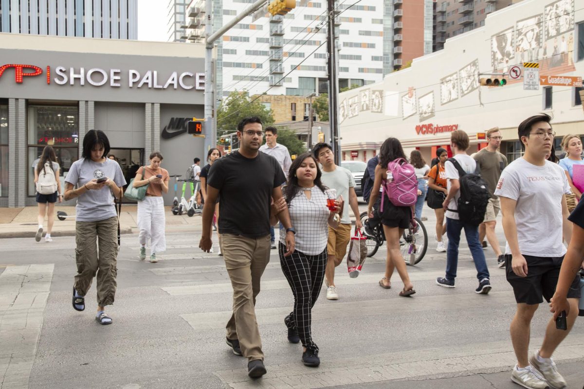 Pedestrians+cross+Guadalupe+Street+on+Sept.+27%2C+2023.+The+City+of+Austin+recently+allocated+%2428.6+million+toward+implementing+street+safety+improvements.
