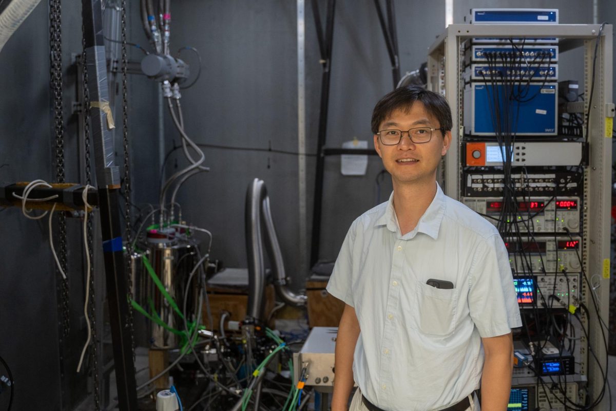 Lai Keji stands in his lab in the Physics, Math, and Astronomy Building on Aug. 28, 2023.