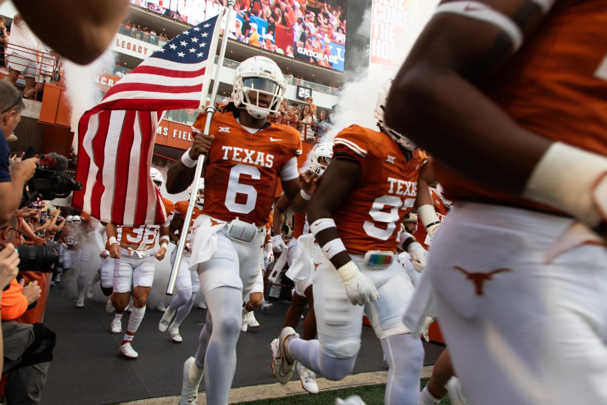The+Texas+Football+team+enters+their+field+ahead+of+the+kickoff+of+their+game+against+Wyoming+on+September+16%2C+2023.