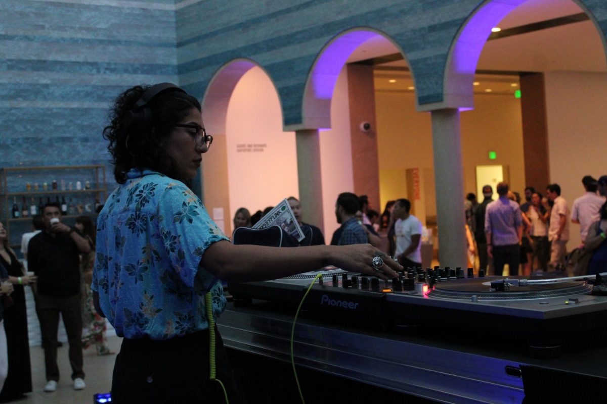 Producer Adrian Quesada DJs for the ancient Mayan and Latino art celebration at the Blanton B-Scene on Friday, Sept. 22, 2023.