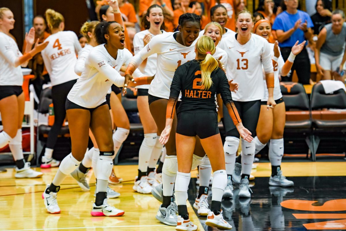 Texas+Volleyball+team+celebrates+in-between+sets+on+Sept.+3%2C+2023.+