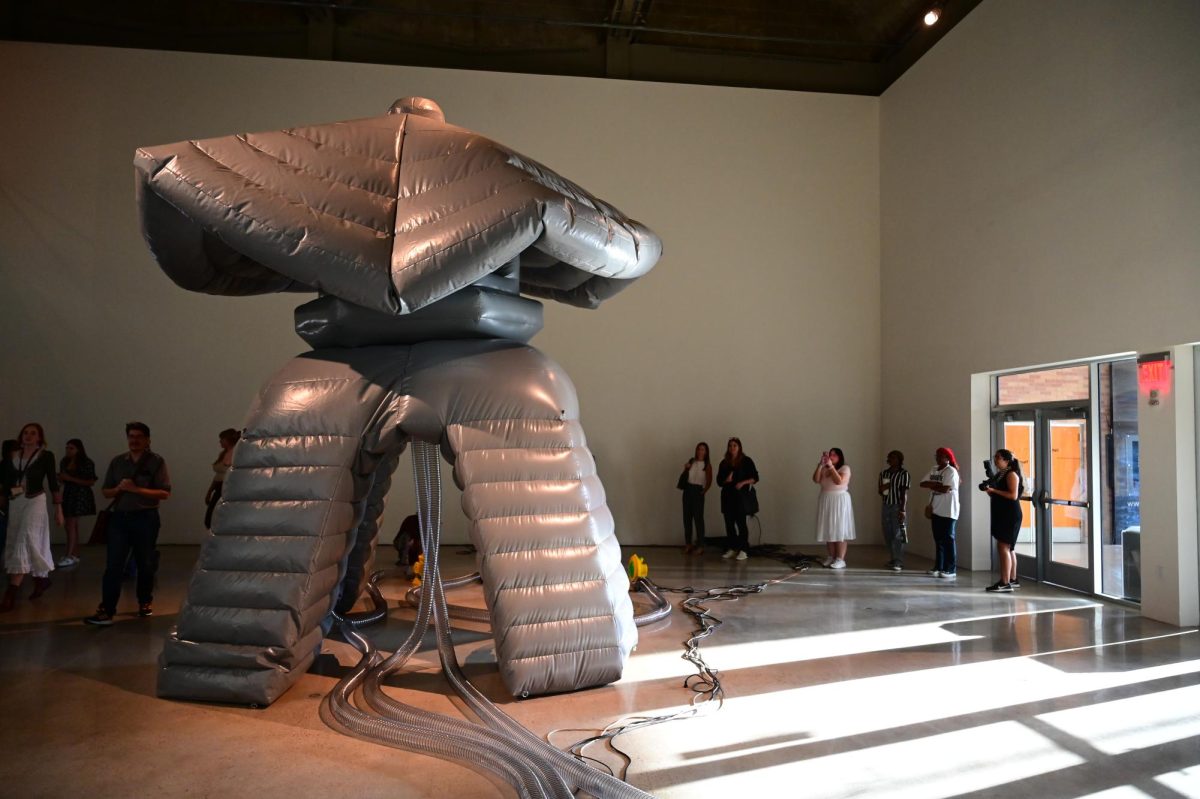 People watch as like a breath of fresh water” by Jacqueline Kiyomi inflates and deflates as part of The Visual Arts Center’s Opening Reception for Fall 2023 Exhibitions on September 25, 2023.