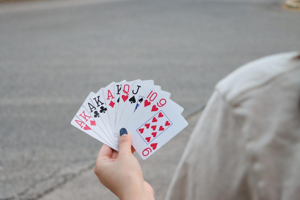 A student holds a deck of cards in Austin, Texas on Sep. 17, 2023.