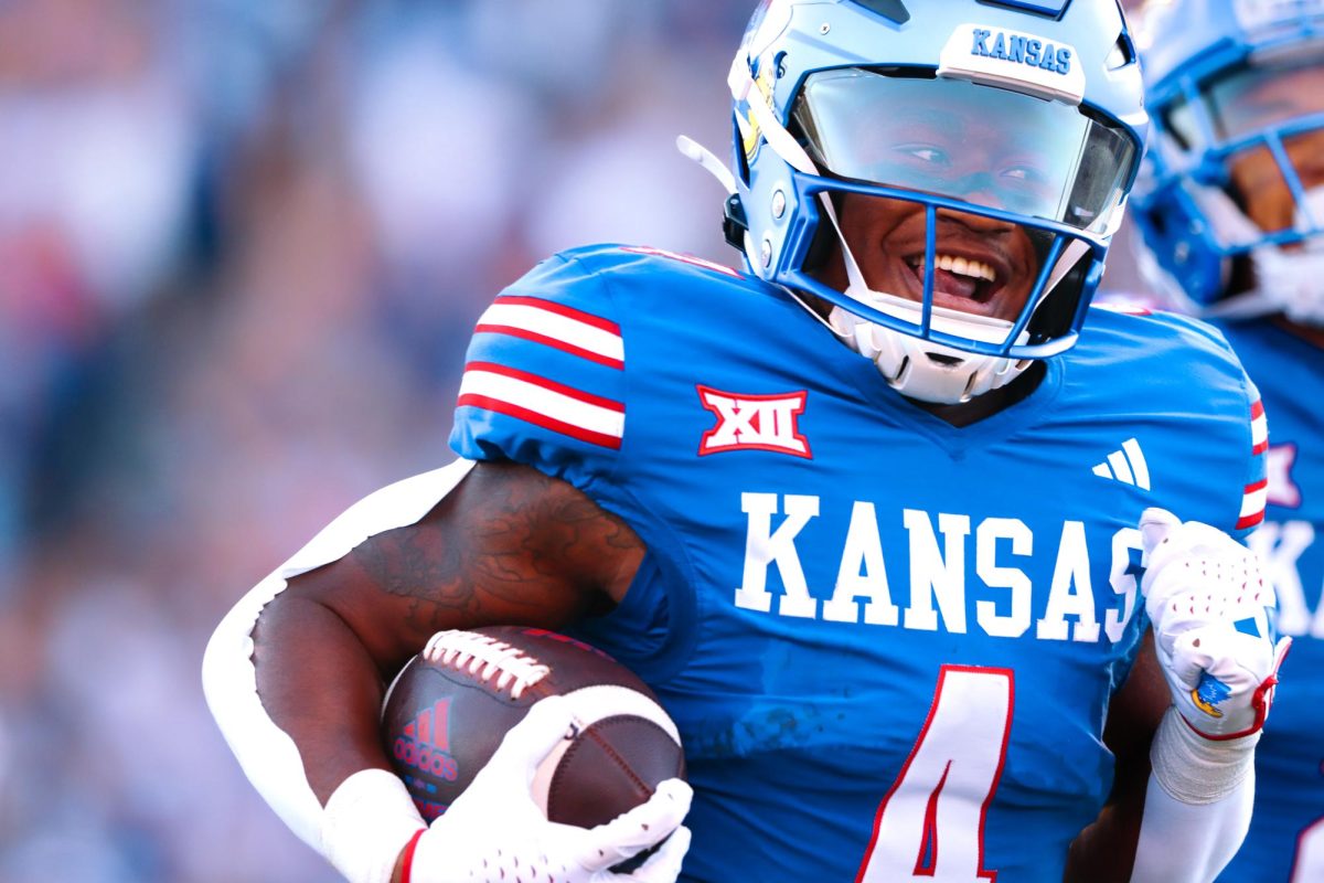 Junior Running Back (No.4) Devin Neal, runs the ball into the endzone for a 48-yard touchdown against the Missouri State offense at David Booth Kansas Memorial Stadium on Sept. 1, 2023. 