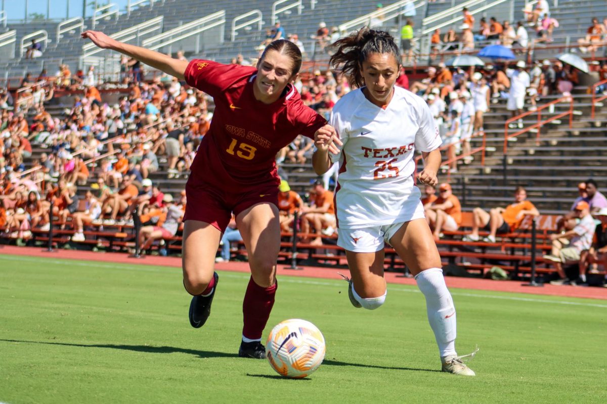 Senior defender Lauren Lapomarda blocks Iowa State forward Alex Campana from the ball. Lapomarda scores the first goal of the game, tying the Longhorns and the Cyclones 1-1 at the half.