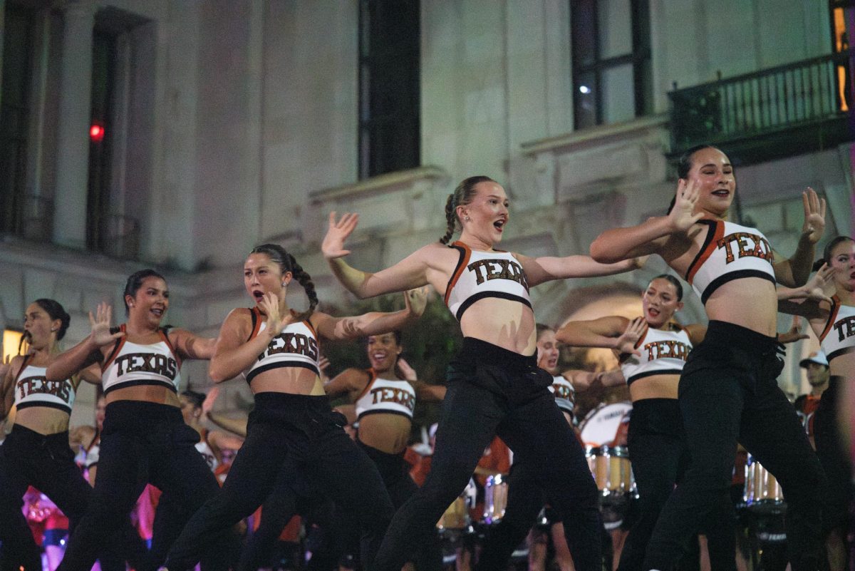 The UT Dance Team performs at the Texas Fight Rally and Parade on Oct. 4, 2023. The team recently partnered with Free People Movement to help raise funds.