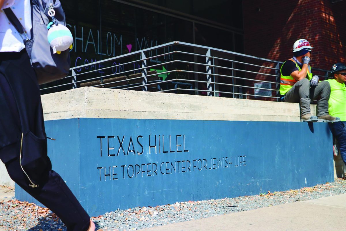 Construction+workers+eat+lunch+as+students+walk+past+the+Texas+Hillel+Topper+Center+for+Jewish+Life+on+Oct.+4%2C+2023.+Hillel+is+the+largest+Jewish+campus+organization+in+the+world.