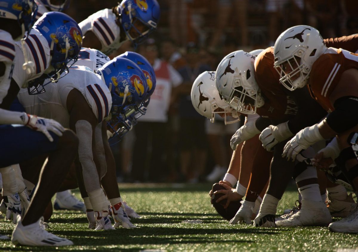 The Jayhawks and the Longhorns line up at the line of scrimmage on Sept. 30, 2023. Texas won the game 40-14.
